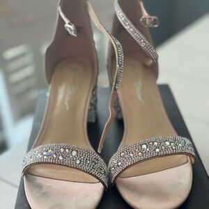 Used once Betsey Johnson heels. Worn for wedding dress fitting only.